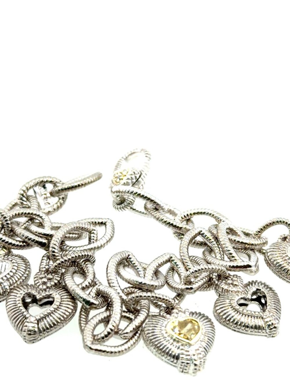Silver with 18kt yellow gold charm bracelet